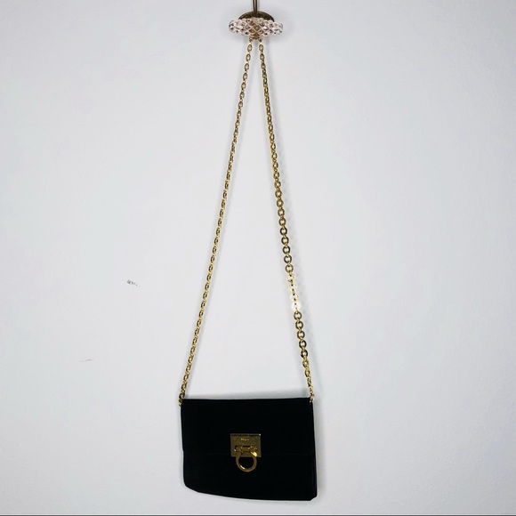 black suede bag with gold chain